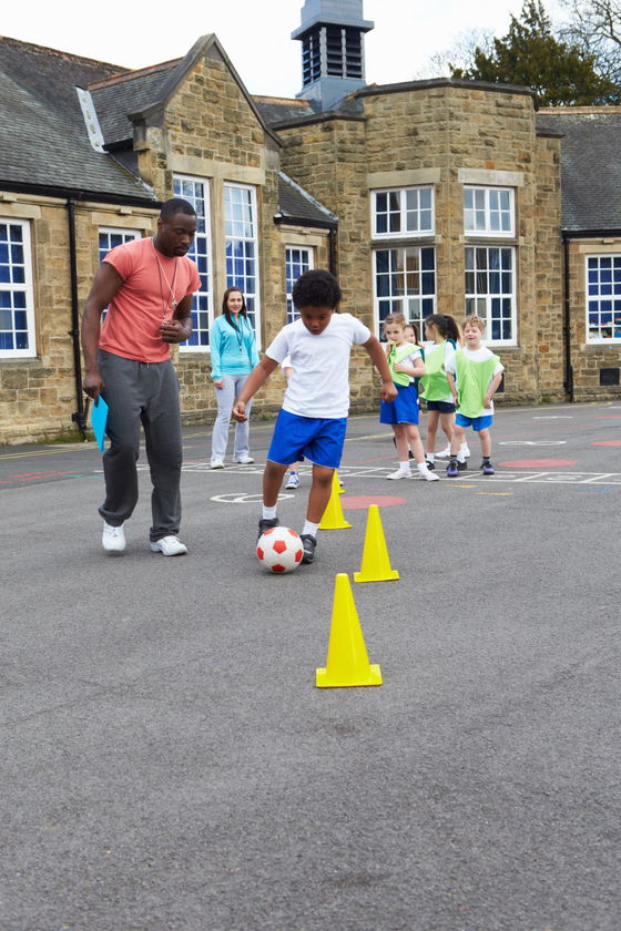 Group Of Children In School Physical Education Class