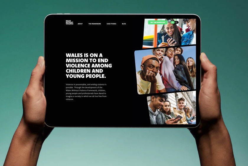 A person holds a tablet displaying a website with the text Wales is on a mission to end violence among children and young people beside photos of diverse, smiling young people using mobiles and socialising.