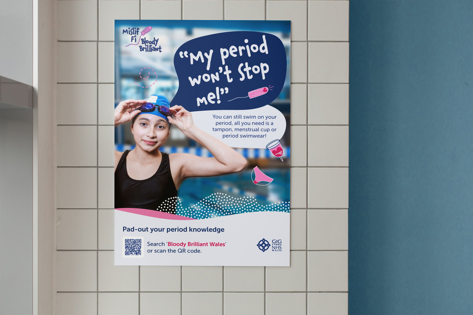 A poster on a tiled wall shows a girl in a swimming costume and swim cap with goggles on her head. The text says, “My period won’t stop me!” and offers advice about swimming during periods. There are period products and a QR code.